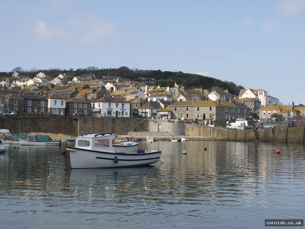 Mousehole harbour, granite cottages and Mount’s Bay