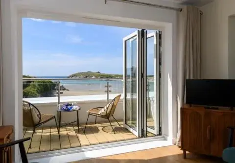 The Beach House & Porth Sands Apartments